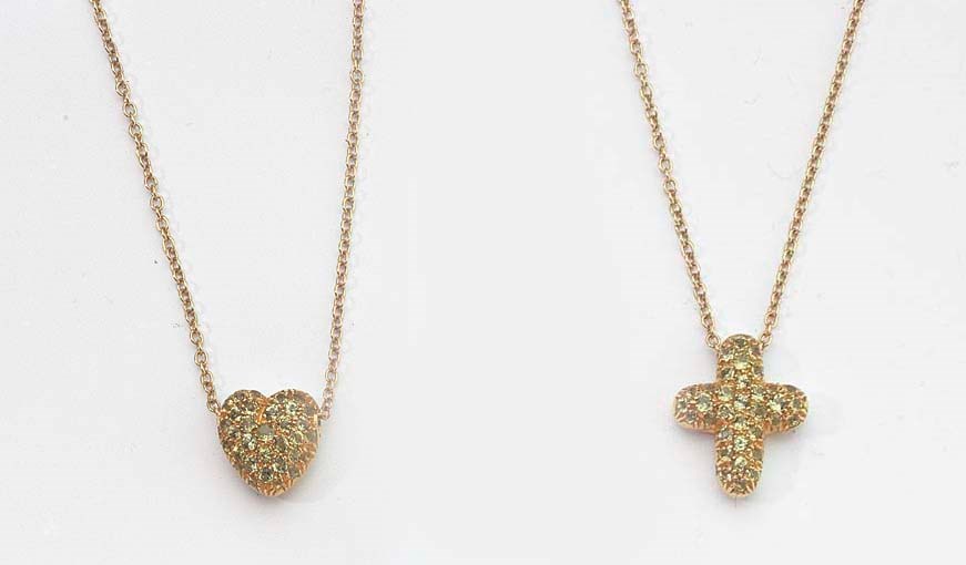 TWO GOLD AND PERIDOT PENDANTS
