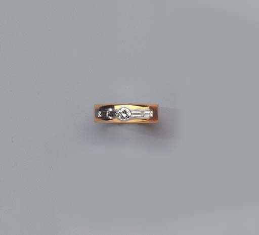 A GOLD PLATINUM AND DIAMOND BANGLE AND RING