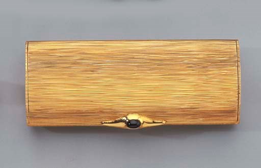 An 18k GOLD CIGARETTE CASE AND POWDER COMPACT