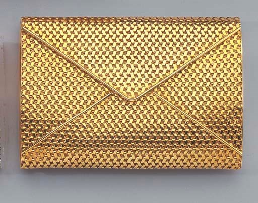 AN 18K GOLD CIGARETTE CASE, LIGHTER AND KEY HOLDER