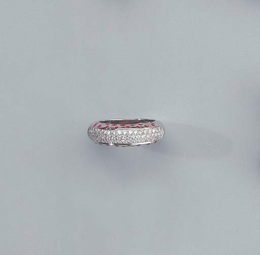 A WHITE GOLD, DIAMOND AND RUBY BANGLE AND RING