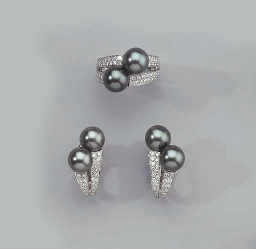 PICCHIOTTI. A WHITE GOLD, DIAMOND AND PEARL RING AND A PAIR OF EAR STUDS