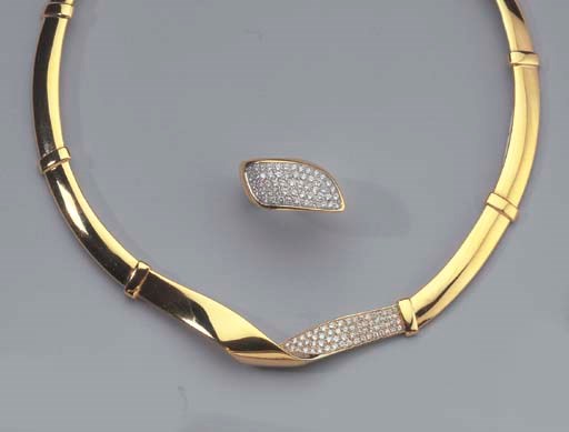 A GOLD AND DIAMOND NECKLACE AND RING