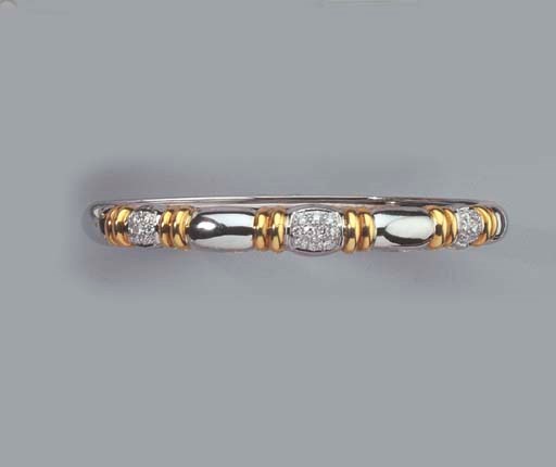 A GOLD AND DIAMOND BANGLE AND A GOLD NECKLACE