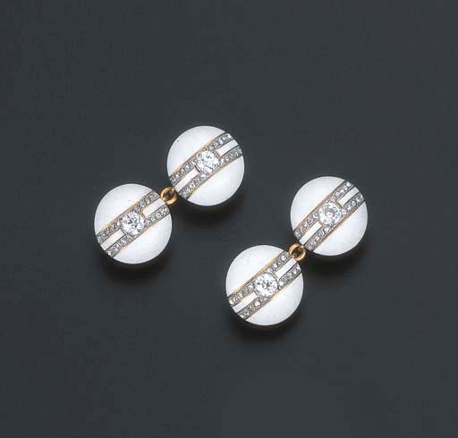 A PAIR OF DIAMOND AND ENAMEL CUFF LINKS, BY CARTIER