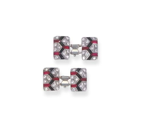 A PAIR OF ART DECO DIAMOND, RUBY AND ONYX CUFF LINKS, BY VAN CLEEF & ARPELS