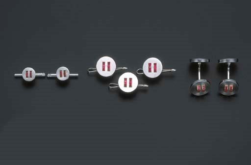 AN ART DECO RUBY DRESS SET, BY CARTIER