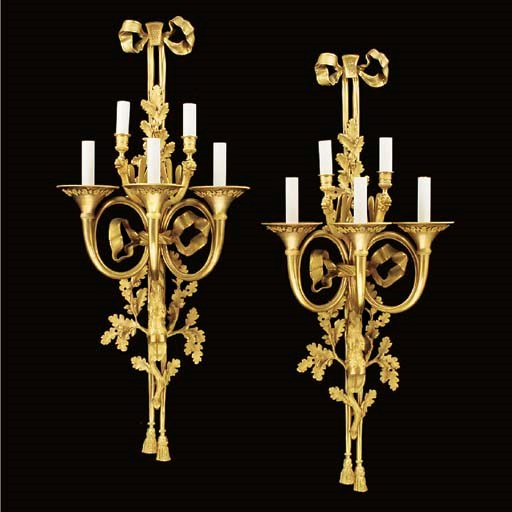 A pair of gilt bronze five light wall appliques, 20th century