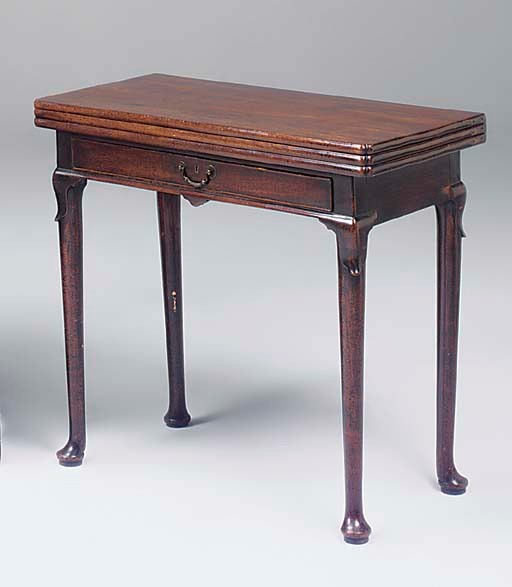 A George II mahogany, sometimes called 'red walnut', triple folding games and tea table