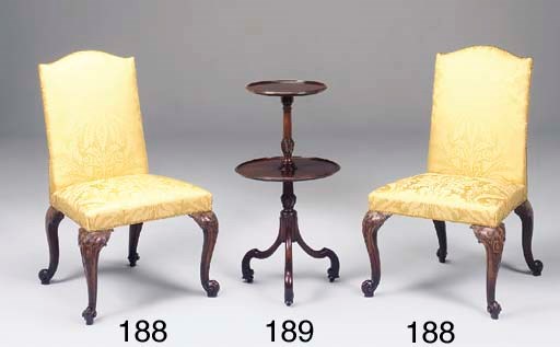 A pair of carved mahogany side chairs
