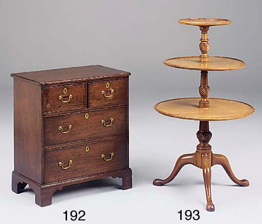 A mahogany triple tier dumb waiter