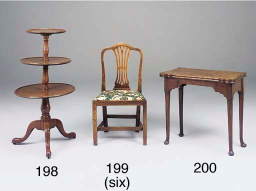 A set of six George III country made walnut, possibly mahogany dining chairs