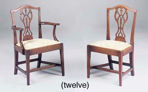 A set of twelve George III mahogany dining chairs