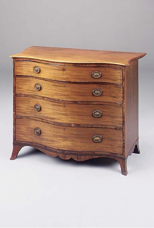 A George III mahogany serpentine dressing chest