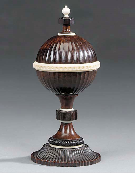 A turned ebony and ivory centrepiece, possibly early 20th century