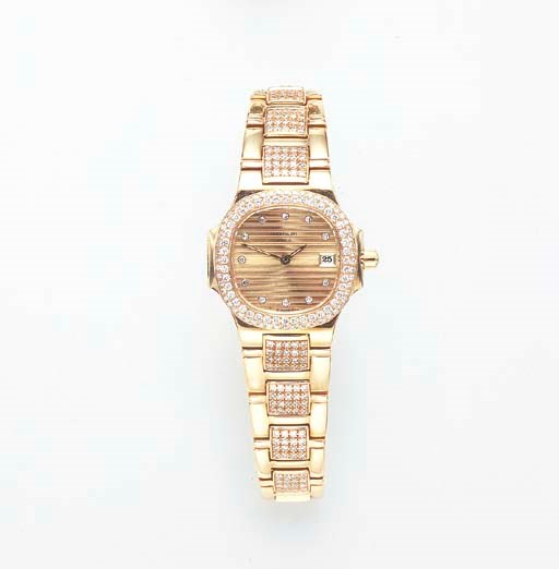 A DIAMOND AND GOLD "NAUTILUS" WRISTWATCH, BY PATEK PHILIPPE