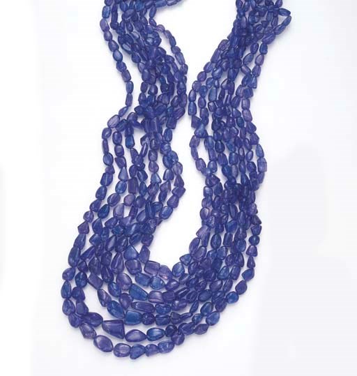 A SEVEN-STRAND TANZANITE BEAD NECKLACE