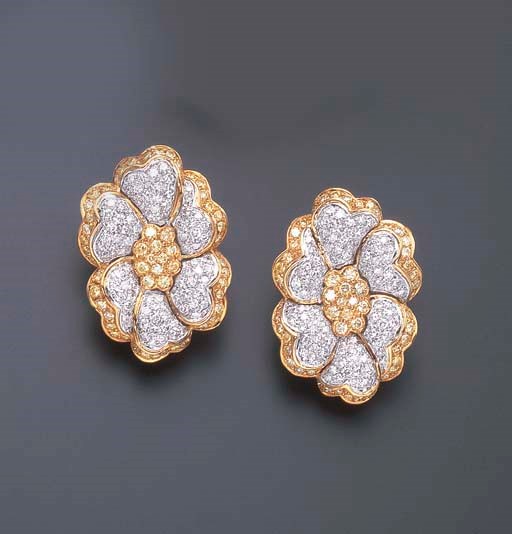 A PAIR OF DIAMOND AND YELLOW DIAMOND EAR CLIPS