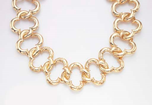 A DIAMOND AND GOLD "ALHAMBRA" NECKLACE, BY VAN CLEEF & ARPELS