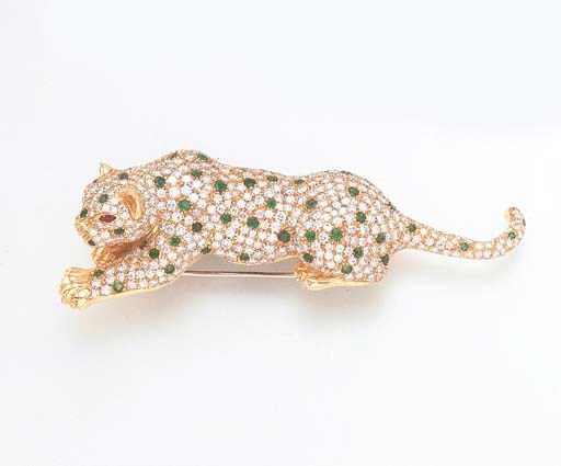A DIAMOND, EMERALD AND RUBY LEOPARD BROOCH