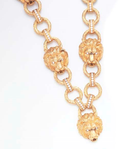 A DIAMOND AND GOLD LION HEAD SAUTOIR, BY VAN CLEEF & ARPELS