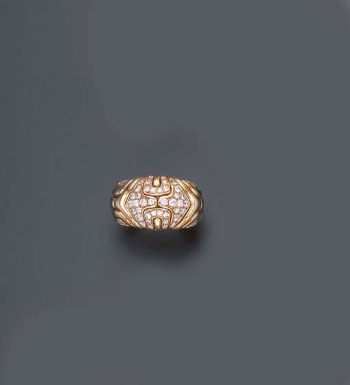 A DIAMOND AND GOLD RING, BY BULGARI