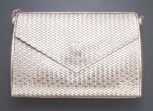 A WHITE GOLD AND DIAMOND EVENING BAG, BY CARTIER