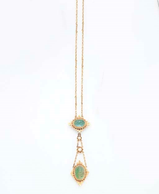 AN IMPORTANT ANTIQUE EMERALD AND GOLD PENDANT NECKLACE, BY MARCUS & CO.
