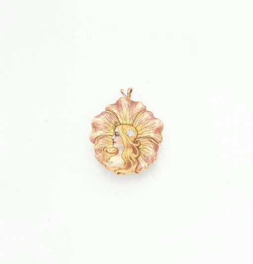 AN ART NOUVEAU ENAMEL AND DIAMOND BROOCH