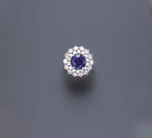 A SAPPHIRE AND DIAMOND RING