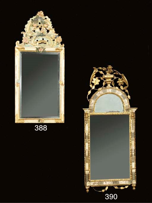 A German giltwood and marble mirror