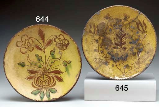A SGRAFFITO DECORATED REDWARE PLATE
