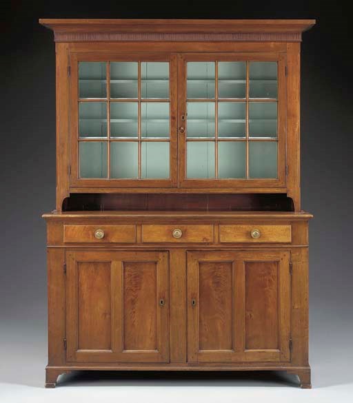 A FEDERAL WALNUT STEP-BACK CUPBOARD