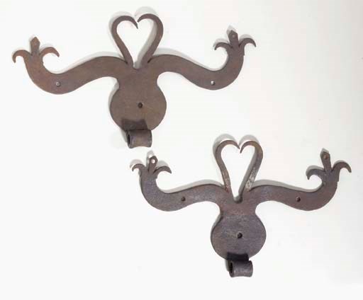 A PAIR OF WROUGHT IRON HINGES