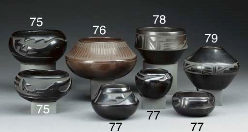 A SAN ILDEFONSO BLACKWARE JAR
