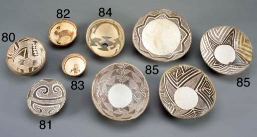 A GROUP OF FOUR CLASSIC MIMBRES BLACK-ON-WHITE BOWLS