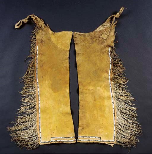 A PAIR OF COMANCHE BEADED HIDE LEGGINGS