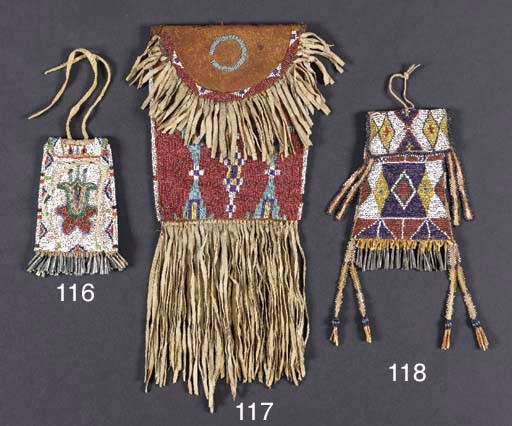 AN APACHE BEADED HIDE STRIKE-A-LIGHT POUCH