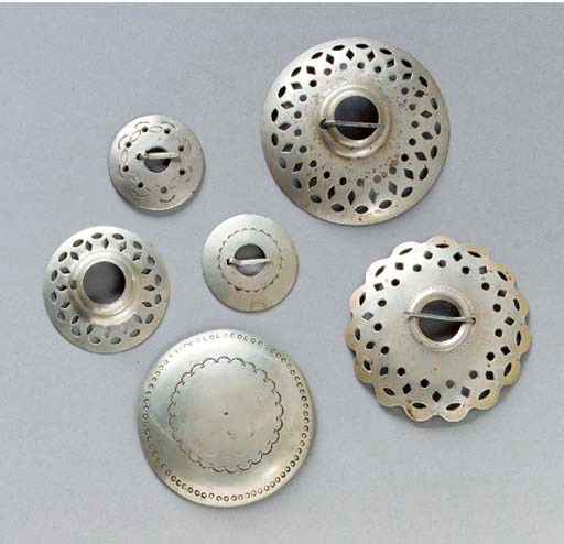 A COLLECTION OF WESTERN GREAT LAKES OR PRAIRIE SILVER ORNAMENTS