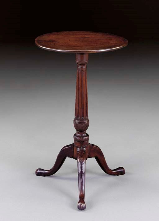 A CHIPPENDALE CARVED MAHOGANY CANDLESTAND