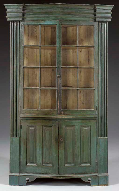 A CHIPPENDALE BLUE-PAINTED PINE CORNER CUPBOARD
