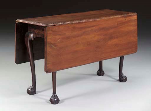 A CHIPPENDALE MAHOGANY DROP-LEAF DINING TABLE