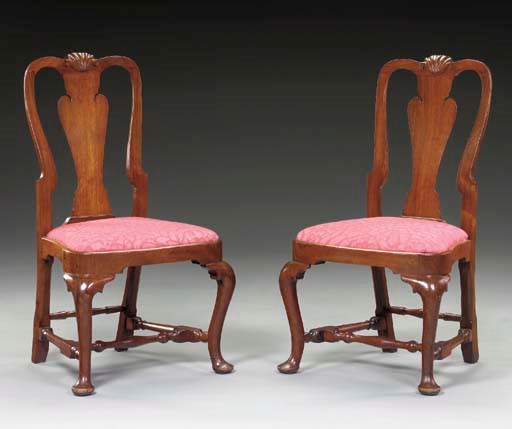 A Pair of Chippendale Carved Walnut Side Chairs