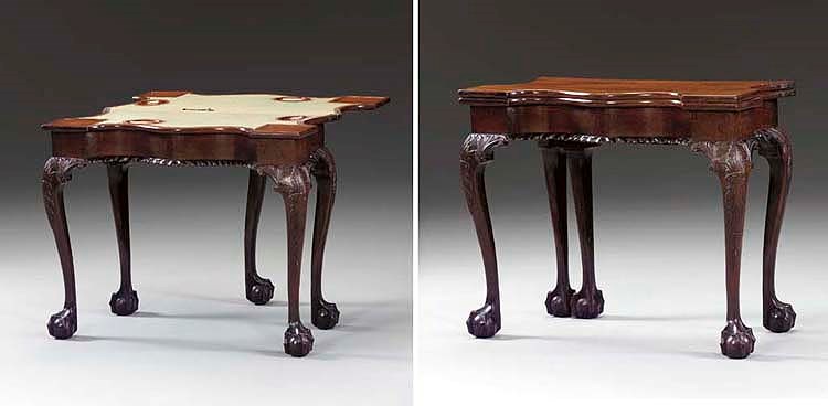 A CHIPPENDALE CARVED MAHOGANY SERPENTINE CARD TABLE