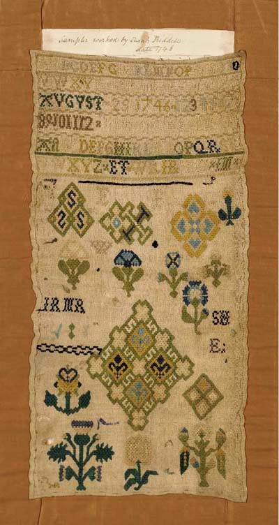 A SILK ON LINEN NEEDLEWORK SAMPLER
