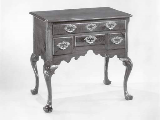 A CHIPPENDALE WALNUT DRESSING TABLE