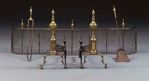 A PAIR OF CHIPPENDALE BRASS ANDIRONS WITH MATCHING FIRE TOOLS AND SCREEN