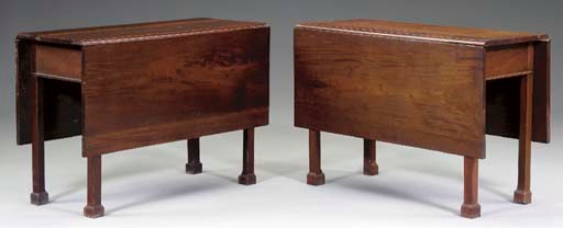 A PAIR OF CHIPPENDALE WALNUT DINING TABLES