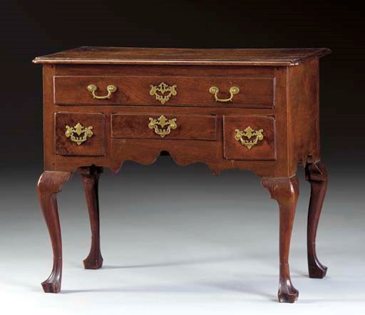A CHIPPENDALE WALNUT DRESSING TABLE