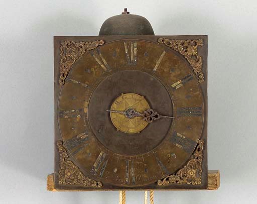 A QUEEN ANNE BRASS CLOCK MOVEMENT